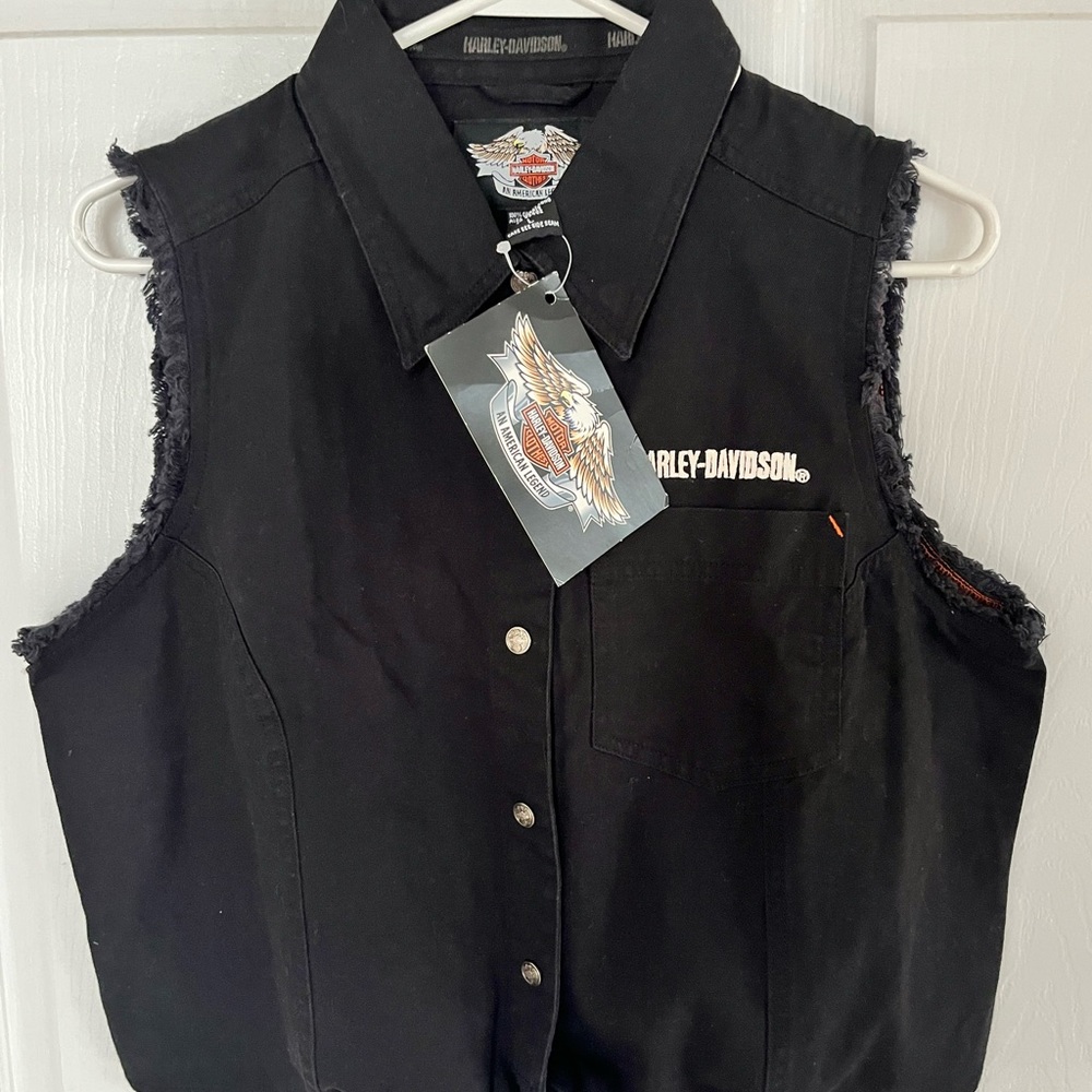 Harley Davidson womens black denim vest brand new with tags. Very nice vest.